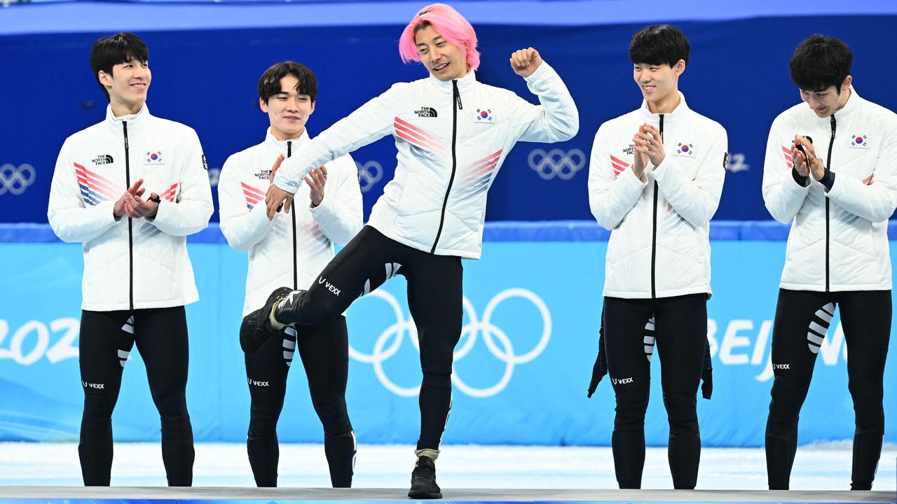 South Korea's Kwak Yoon-gy dances on the Olympics podium. Picture: Sebastien Bozon / AFP