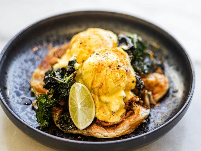 Bumi Cafe's Roti Egg Benedict features eggs served on a flaky roti bread with five spice pulled pork and calamansi (a Philippine lime) and hollandaise. This is Bumi’s take on the brunch staple with a southeastern Asian twist. Picture: Hatha Hardjabrata