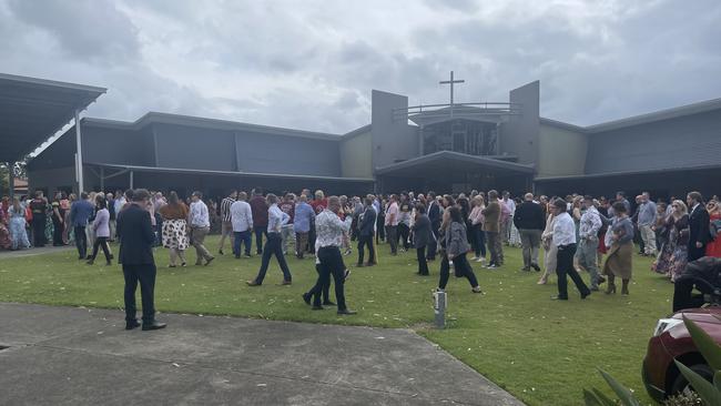 Hundreds of people attended Michael Warburton's funeral at the Wynnum Baptist Church.