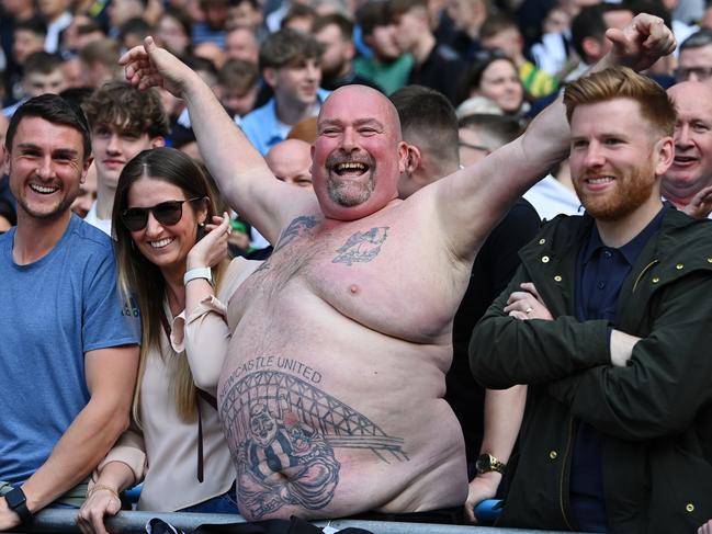 MANCHESTER, ENGLAND - MAY 08: Fans of Newcastle United pose for a photograph prior to kick off of the Premier League match between Manchester City and Newcastle United at Etihad Stadium on May 08, 2022 in Manchester, England. (Photo by Stu Forster/Getty Images)