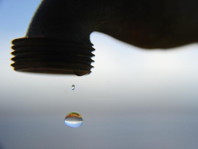 Water dripping from tap