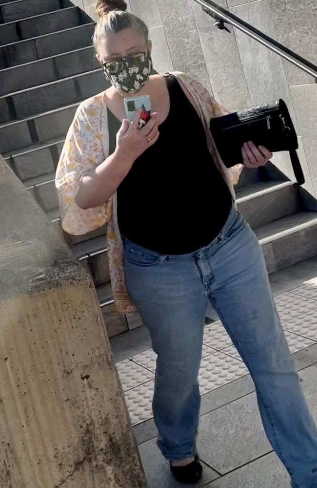 Paige Kaye Ellysa Petersen, 41, leaves Beenleigh Magistrates Court after pleading guilty to driving while over the middle alcohol limit and dangerous operation of a vehicle.