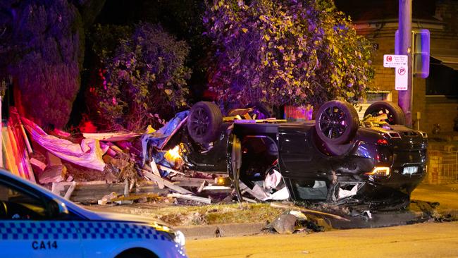 Carnage....The Land Rover flipped on its roof in Canterbury Road. Picture: Damian Hofman.