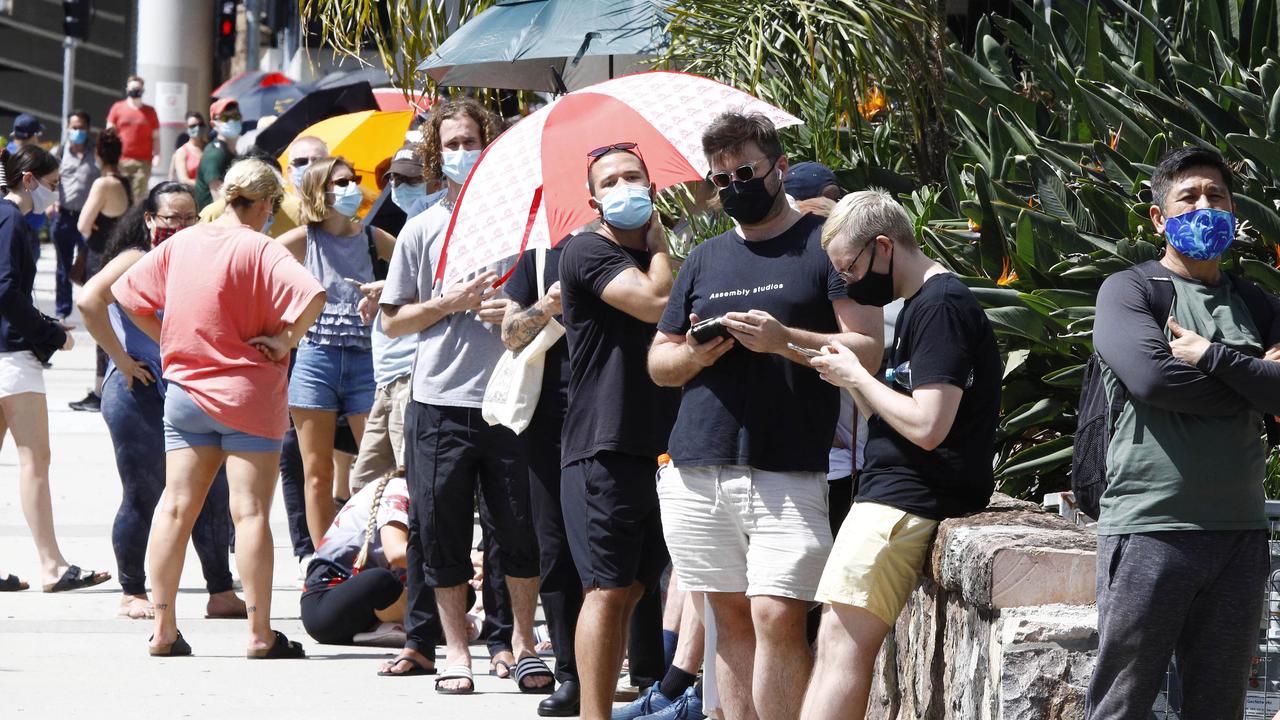 People line up for Covid testing at the Royal Women's Hospital in Brisbane with the chief health officer warning all Queenslanders would be exposed in coming weeks. Picture: Tertius Pickard