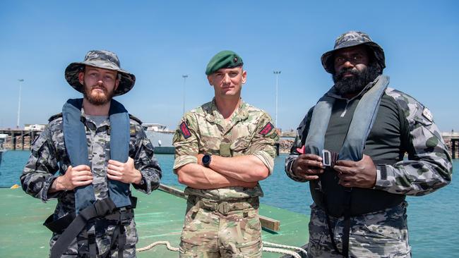 AB Darcy Limbsch (left) Cpl Jones (centre) AB Warusam at the first HMAS Coonawarra open day in seven years. Picture: Pema Tamang Pakhrin