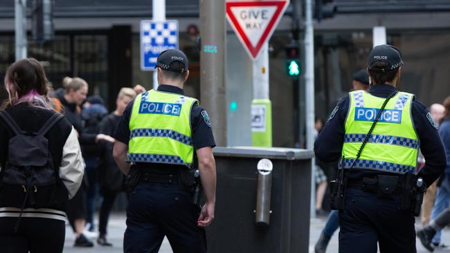 Police in the CBD. Picture: Brett Hartwig