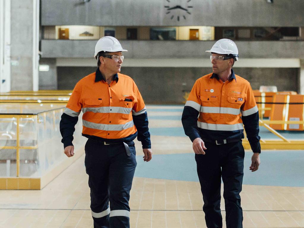 Snowy Hydro area manager, Guy Boardman (left) and Access and assurance manager Peter Symons on the operating floor inside Tumut 3 Power StationPhoto by Rohan Thomson4 September 2019