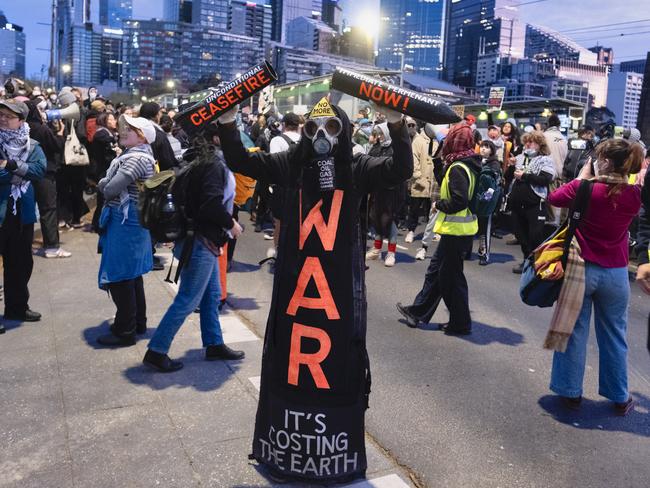 Protesters rally outside the Land Forces expo on Wednesday morning. Picture: Luis Enrique Ascui