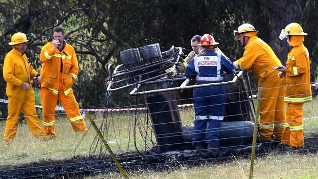 Emergency services at the debris of a hot-air balloon that crashed. Picture: Nicole Garmston