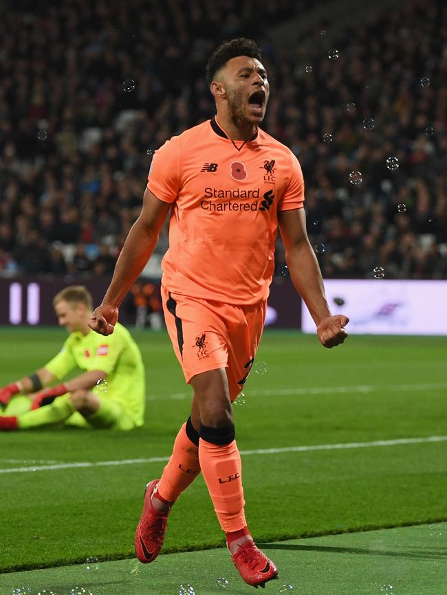 Alex Oxlade-Chamberlain of Liverpool celebrates scoring.