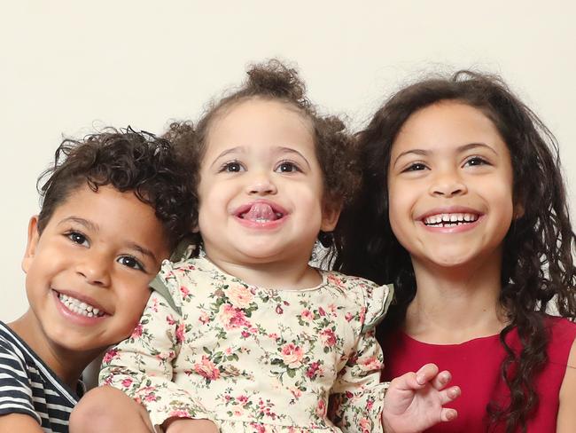 Pictured at their home in Leichhardt are siblings Hayden Daniel (4) Lani Daniel (21 months) and Layla Daniel (6).Lani was born dangerously premature and so has spent her entire life at the children's hospital in Randwick. This will be her first Christmas home.Picture: Richard Dobson