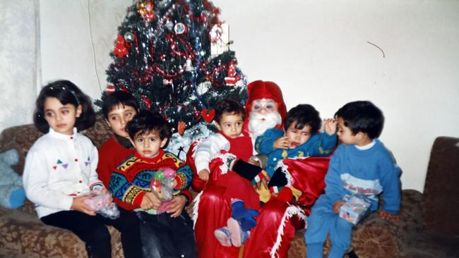 Jabra Tarazi as a child (2nd from left at back) in Gaza with extended family members. Picture: Sam Ruttyn