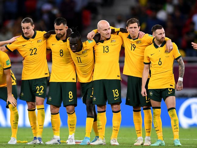 DOHA, QATAR - JUNE 13: Australia watches on during the penalty shootouts in the 2022 FIFA World Cup Playoff match between Australia Socceroos and Peru at Ahmad Bin Ali Stadium on June 13, 2022 in Doha, Qatar. (Photo by Joe Allison/Getty Images)