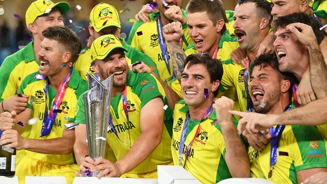 Aaron Finch of Australia celebrates with the ICC Men's T20 World Cup Trophy. Photo by Gareth Copley-ICC/ICC via Getty Images