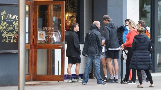 No social distancing in parts of Manly on the beach front and a cafe on the South Steyne. picture John Grainger