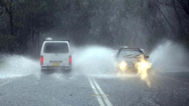 Motorists have to battle along a heavily flooded Wakehurst Parkway on average four times a year. Picture: Manly Daily