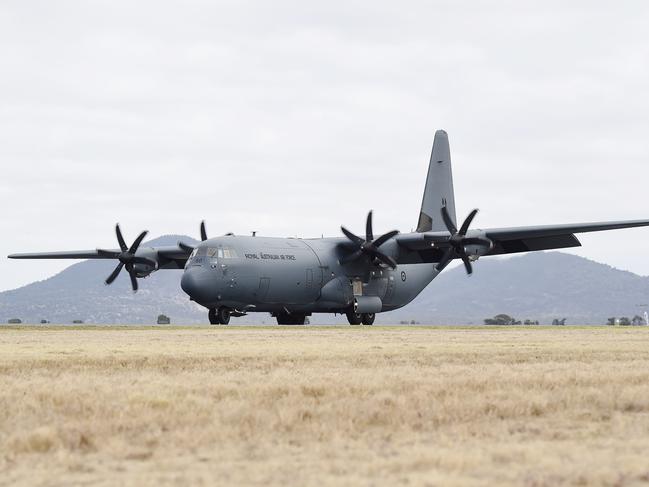 The C-130J Hercules aircraft is transporting fire equipment and personnel. Picture: Alan Barber