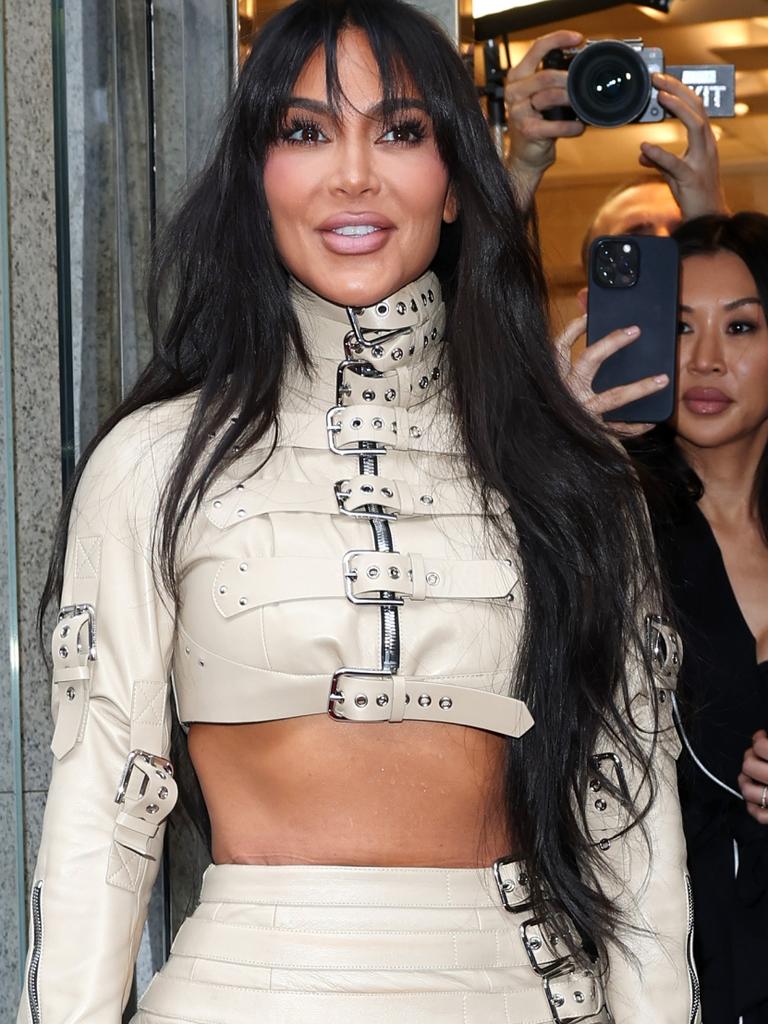 Photos reveal Kim Kardashian's 'real' face.   — Australia's  leading news site