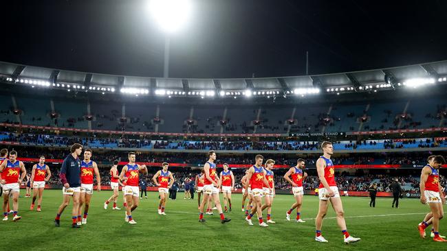 The Lions look dejected (Photo by Dylan Burns/AFL Photos via Getty Images)