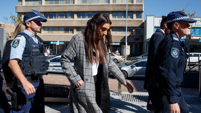 Tianan Savignano, the girlfriend of Johnson Kokozian, is arrested outside Liverpool Court on Wednesday. Kokozian is accused of driving a car that killed two siblings on Friday night. Picture: NCA NewsWire