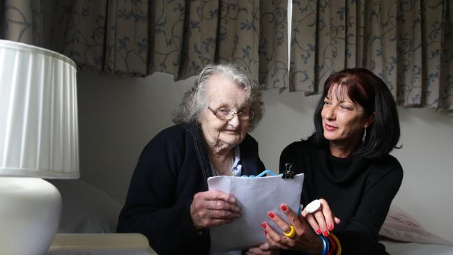 Staff member Martina Goulden with Fay Sheppard.