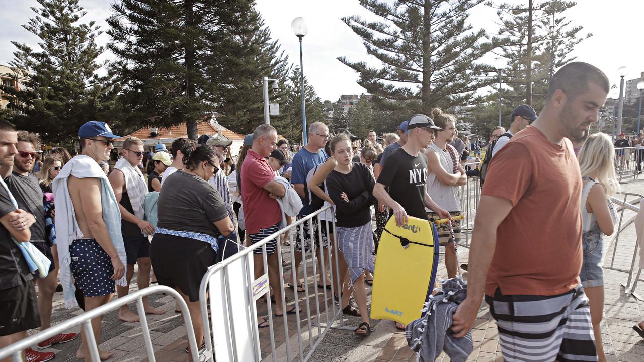 Large crowds squeeze into the entrance of Coogee beach on April 26. Picture: Adam Yip