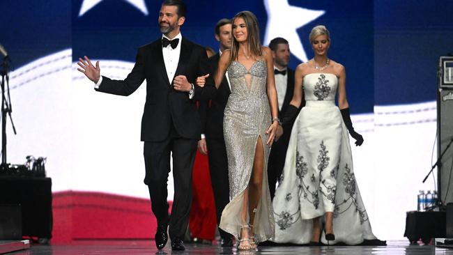 She paired her white ballgown with striking black opera-length gloves – an unusual combo. Picture: Jim Watson/AFP