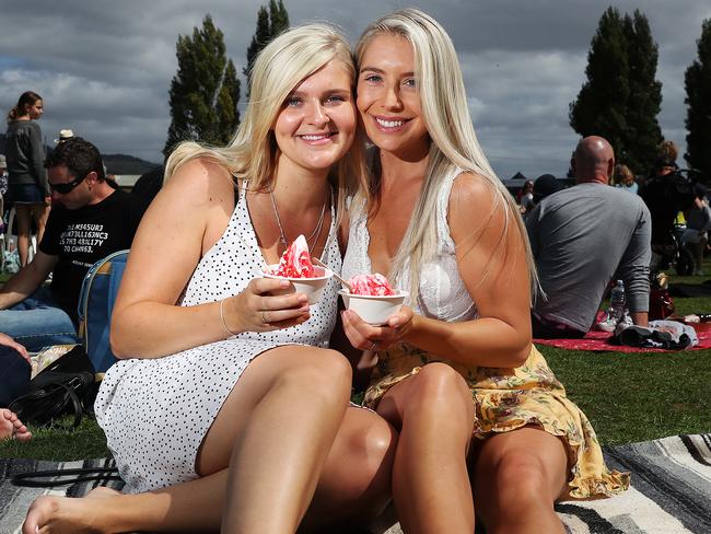 Lauren Sutton, of Dodges Ferry, left, and Emily Eiszele, of Howrah, enjoying ice cream at the show. Picture: NIKKI DAVIS-JONES