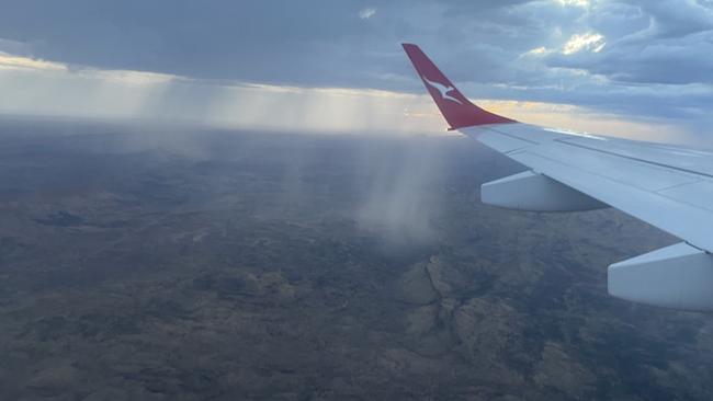 Rain over Central Australia on the Alice Springs to Darwin flight, February 2025. Picture: Gera Kazakov