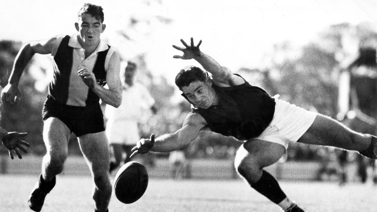 Barassi (right) was a giant of the sport. [Sun 19/5/1958]