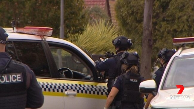 Police surround an Elizabeth Vale address after reports of gunfire on Friday. Picture 7 News