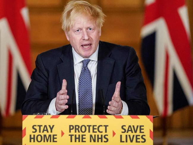 (FILES) A handout image released by 10 Downing Street, shows Britain's Prime Minister Boris Johnson speaking during a remote press conference to update the nation on the COVID-19 pandemic, inside 10 Downing Street in central London on April 30, 2020. Former UK prime minister Boris Johnson will face tough questioning at a public inquiry on December 6, 2023 over his government's handling of the Covid-19 pandemic, after a barrage of criticism from his former aides. Nearly 130,000 people died with Covid in the UK by mid-July 2021, one of the worst official per capita tolls among Western nations. (Photo by Andrew PARSONS / 10 Downing Street / AFP) / RESTRICTED TO EDITORIAL USE - MANDATORY CREDIT 