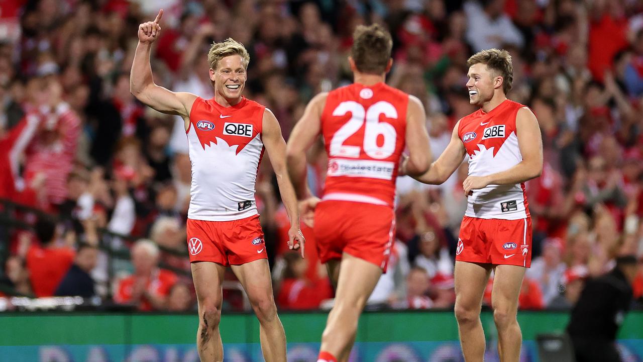 SYDNEY, AUSTRALIA - SEPTEMBER 20: Isaac Heeney of the Swans celebrates kicking a goal during the AFL Preliminary Final match between Sydney Swans and Port Adelaide Power at Sydney Cricket Ground, on September 20, 2024, in Sydney, Australia. (Photo by Cameron Spencer/Getty Images)