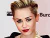  14/11/2013 WIRE: US singer Miley Cyrus poses for photographers on the red carpet as she arrives for the Bambi awards at the ...