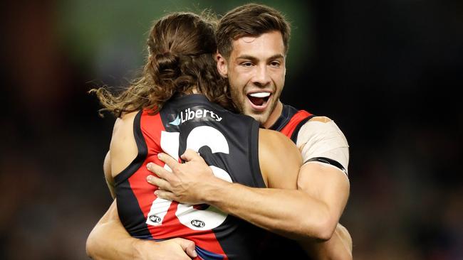 Archie Perkins and Kyle Langford celebrate another Bombers goal.