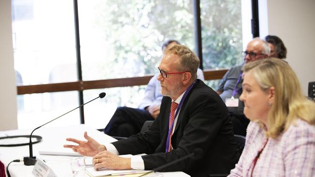 Crime and Corruption Commission chair Alan MacSporran criticises the Palaszczuk Government’s proposed integrity laws at a public hearing (AAP Image/Attila Csaszar)