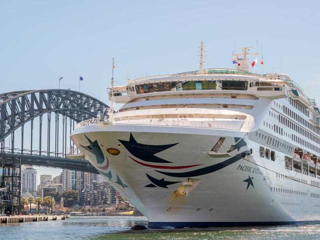 Sydney, Australia - April 19, 2022: Pacific Explorer cruise ship on the way from Sydney Harbour to White Bay Cruise Terminal viewed from the Circular Quay.Escape 18 August 2024Cruise MainPhoto - iStock