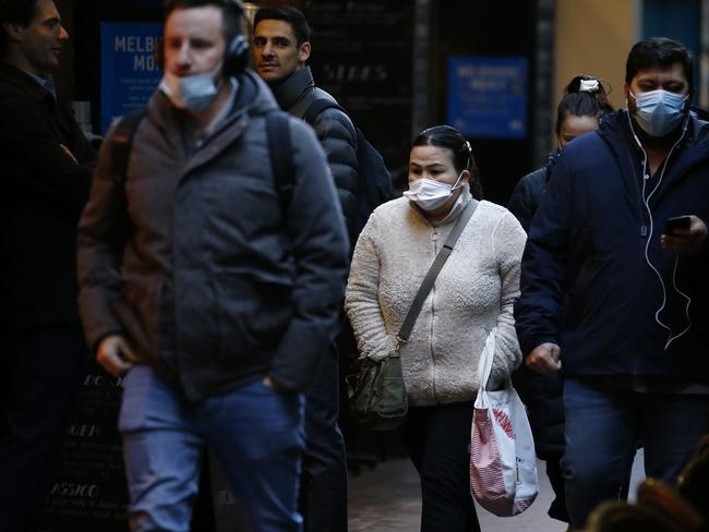 MELBOURNE, AUSTRALIA - NewsWire Photos JULY 09, 2021:  People are seen walking along Degraves Street in Melbourne, Victoria. Picture: NCA NewsWire / Daniel Pockett