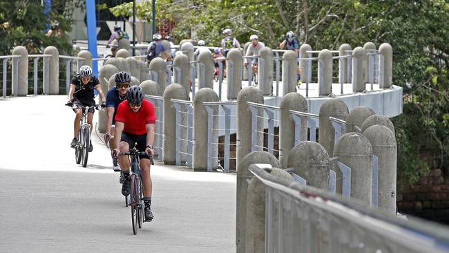 Cyclists have to detour along the City Reach Boardwalk near the Story Bridge, then bypass construction work using city streets before crossing at the Kangaroo Point green bridge. Picture: AAP/Regi Varghese