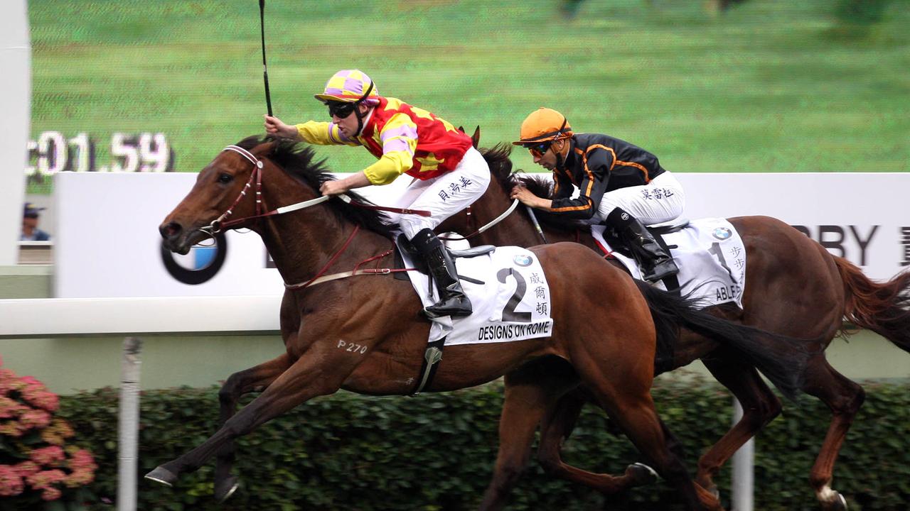 Tommy Berry wins the Hong Kong Derby on Designs On Rome at Sha Tin on Sunday from Able Friend