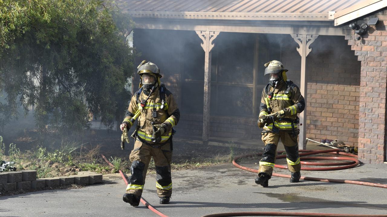 Emergency services rushed to save a Kingsthorpe house engulfed by flames. Pictures: Kevin Farmer