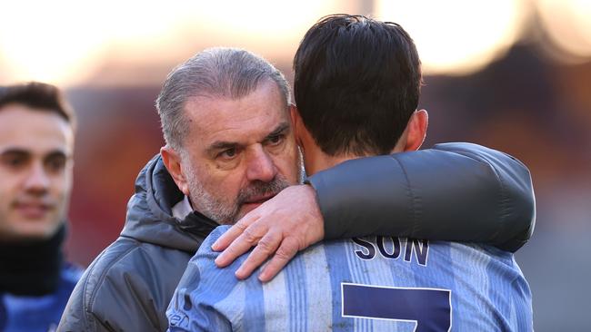 BRENTFORD, ENGLAND - FEBRUARY 02: Ange Postecoglou, Manager of Tottenham Hotspur, celebrates victory with Son Heung-Min of Tottenham Hotspur after the Premier League match between Brentford FC and Tottenham Hotspur FC at Brentford Community Stadium on February 02, 2025 in Brentford, England. (Photo by Ryan Pierse/Getty Images)