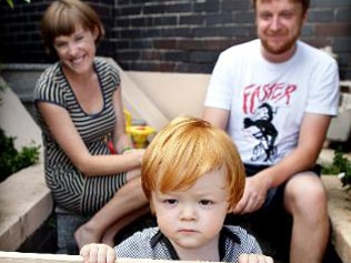 Sarah Emms and Strathmore Meurer with their son Louis, 15 months, at their Petersham home. Picture: Kristi Miller