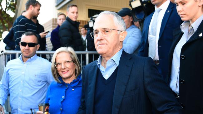 Malcolm Turnbull and wife Lucy leave the polling station after casting their vote. Picture: William West/AFP