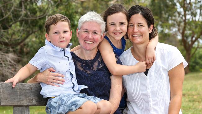 Noah, 5, and Matilda, 7, with mum Mel Davies and her partner Megan Dodds. Picture: Ian Currie