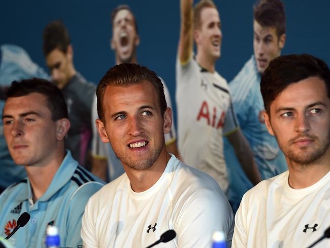 Tottenham Hotspur striker Harry Kane (c) is flanked by Sydney FC defender Sebastian Ryall (left) and Tottenham teammate Ryan Mason at a press conference in Sydney on Thursday.