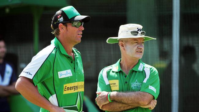 Shane Warne chats to coach Greg Shipperd at a Melbourne Stars coaching session.