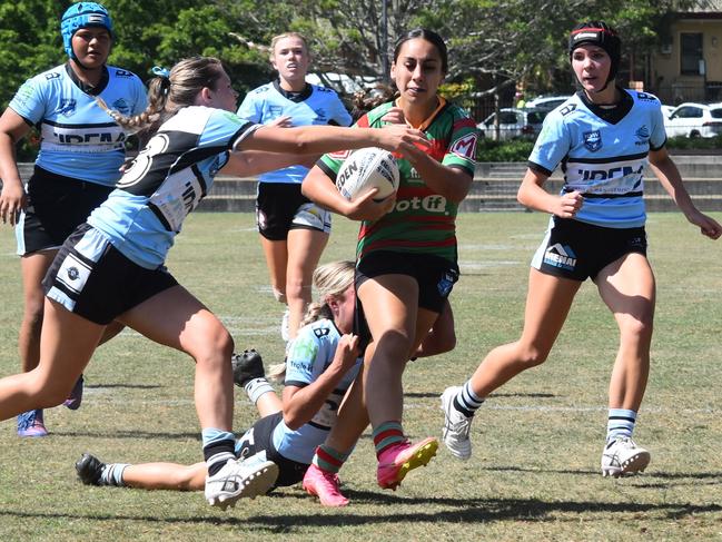 Milla Caine (left) makes a tackle. Picture: Sean Teuma