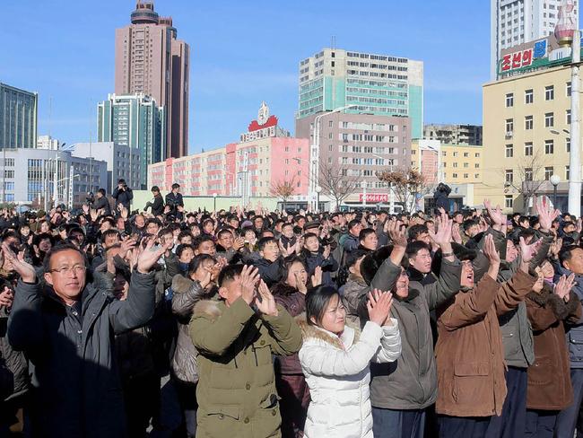 People in Pyongyang celebrate the test of a Hwasong-15 intercontinental ballistic missile (ICBM). Picture: KCNA/AFP