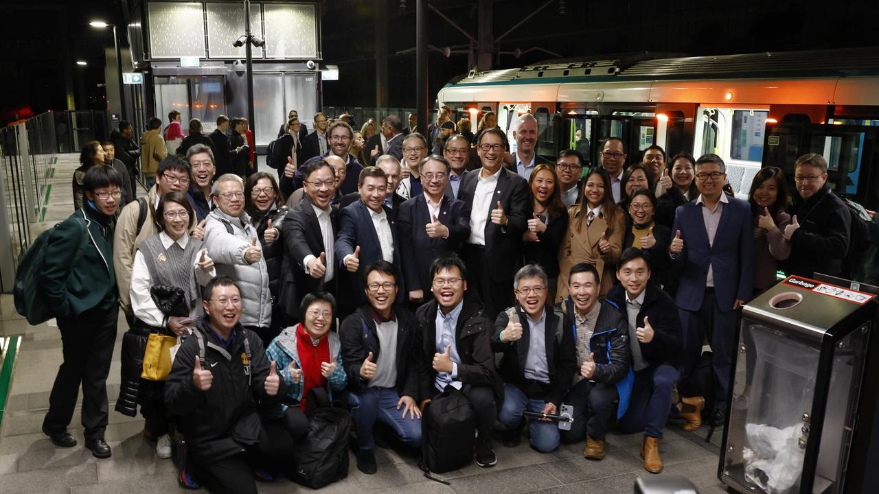 Pictured at Tallawong Station are MTR employees who developed system integration for the Sydney Metro and who were some of the first passengers on the brand new Sydney Metro on its maiden run to Tallawong which left Sydenham Station at 4.54am. Picture: Richard Dobson